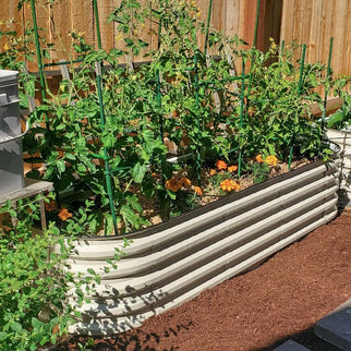 modern metal raised beds in yard-Vegega