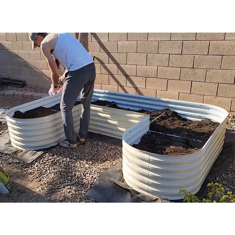 filling u shaped raised garden bed with soil-Vegega