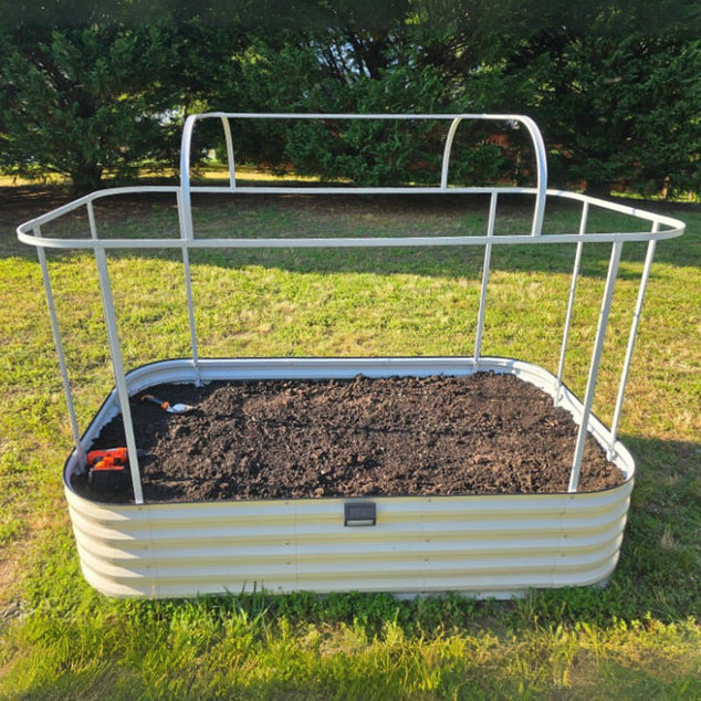 raised garden bed cover frame installed on metal garden bed